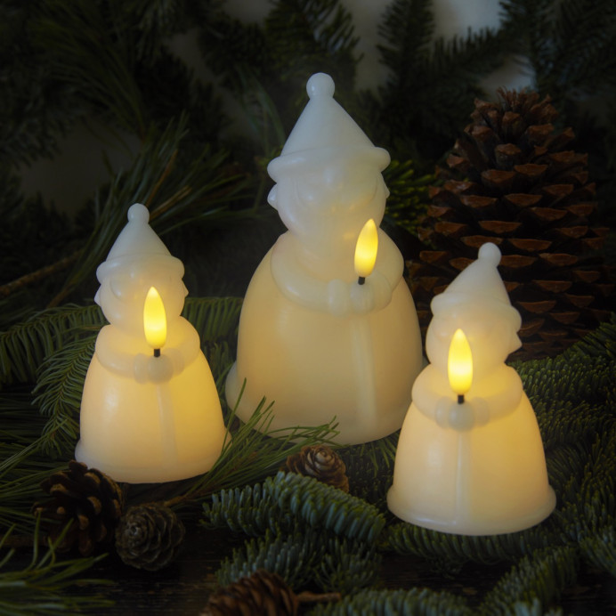 Père Noël lumineux en cire CLAUS tenant une bougie